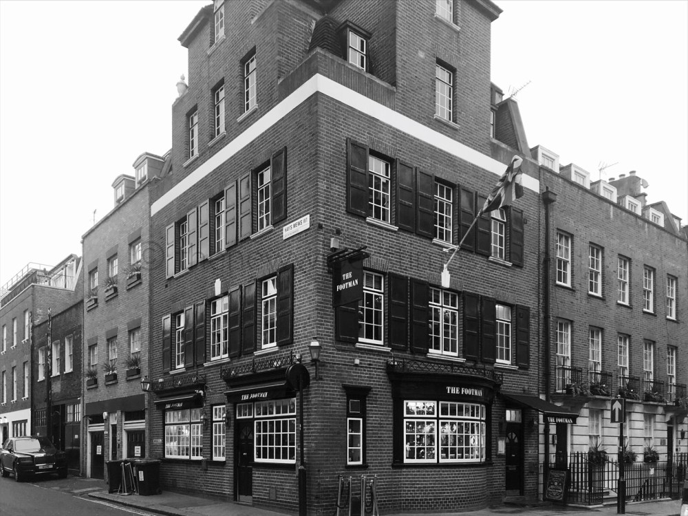 The 'Running Footman', Charles Street, Mayfair, London W.1. The Footman Pub Public House Watney, Combe, Reid & Co., Ltd.
